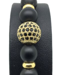 Bracelet perle noire onyx avec perle centrale en zircon et rhodié