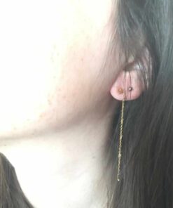 Boucle d'oreille acier couleur or fil d'étoiles