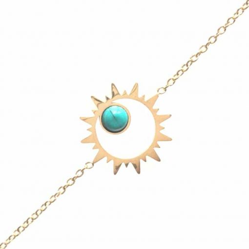 Bracelet souple Acier inoxydable couleur or avec un soleil central avec une petite perle couleur turquoise à l'intérieur.